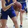 Autumn Arndt looks for a teammate in the January 29 game at Marion County.